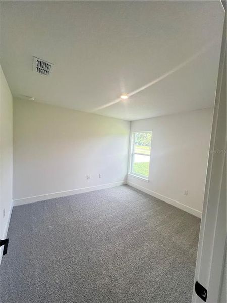 Spacious, unfurnished interior of a new home in Hill Country Estates, Dade City (Image 26).