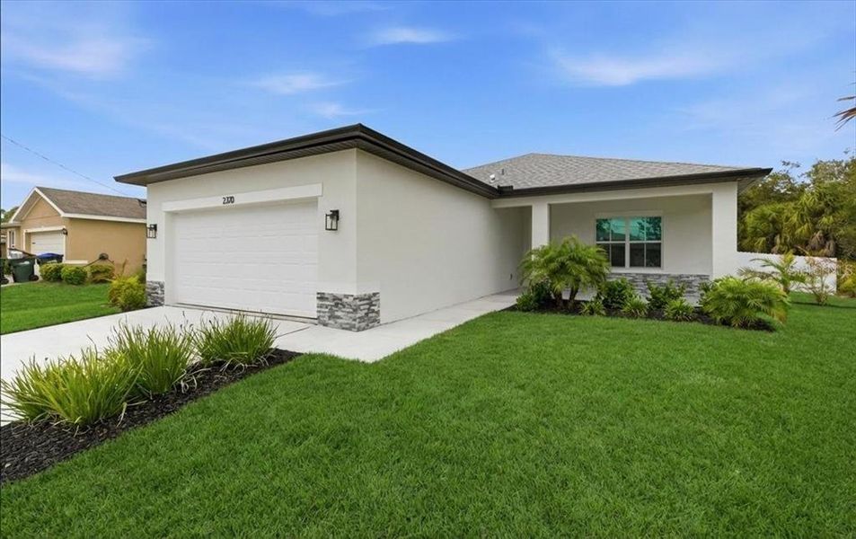 Front exterior of a new home in , North Port, FL, highlighting curb appeal (Image 28).