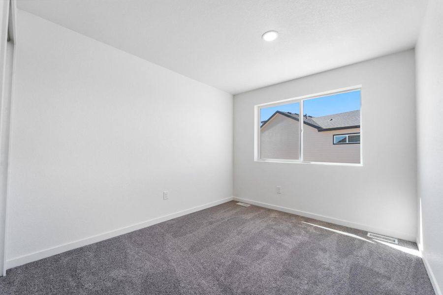 Spacious, unfurnished interior of a new home in Conestoga, Ault (Image 13).