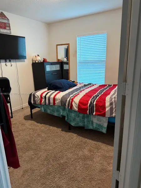 Furnished interior view inside a new home in , Port St. Lucie (Image 13).