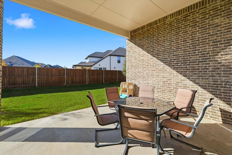 Exterior details and patio area of a home in Watercress 65', Haslet (Image 24). Exterior details and patio area of a home in Watercress 65', Haslet (Image 24).