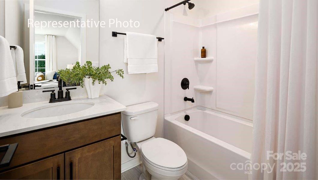 Furnished interior view inside a new home in Sanctuary at Southgate, Indian Trail (Image 6).