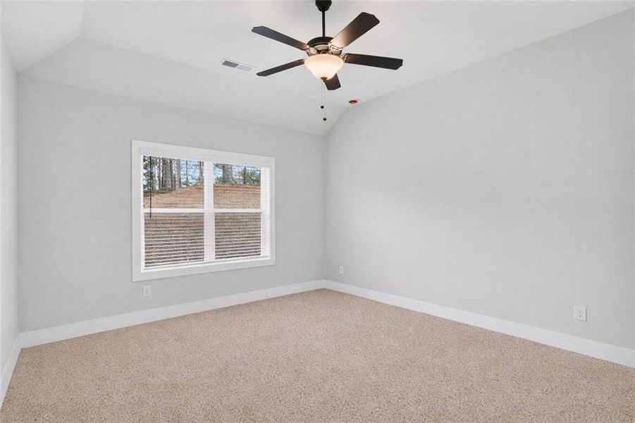 Spacious, unfurnished interior of a new home in The Fairways at Mirror Lake, Villa Rica (Image 20).