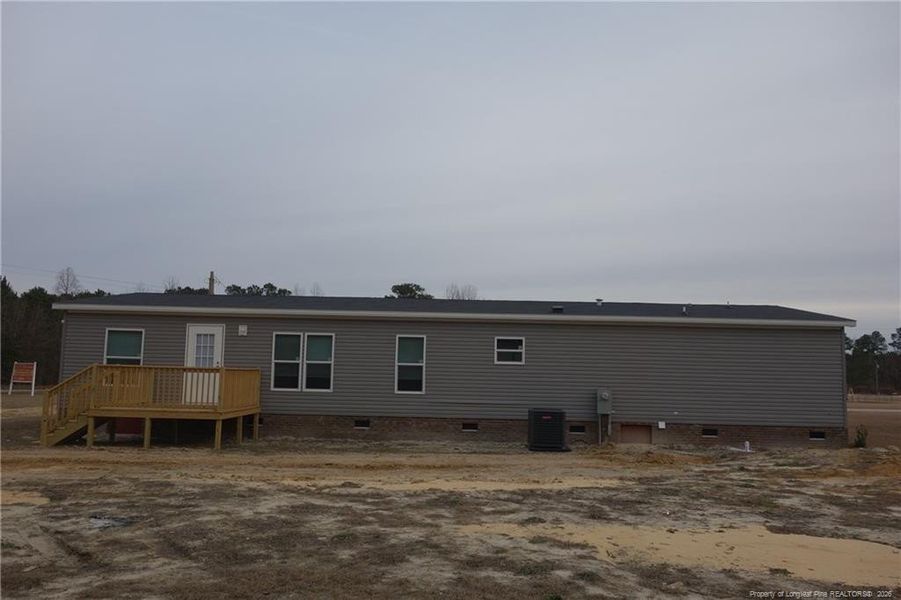 Back view and spacious yard