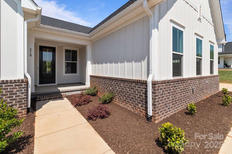 Front exterior of a new home in , Salisbury, NC, highlighting curb appeal (Image 14).