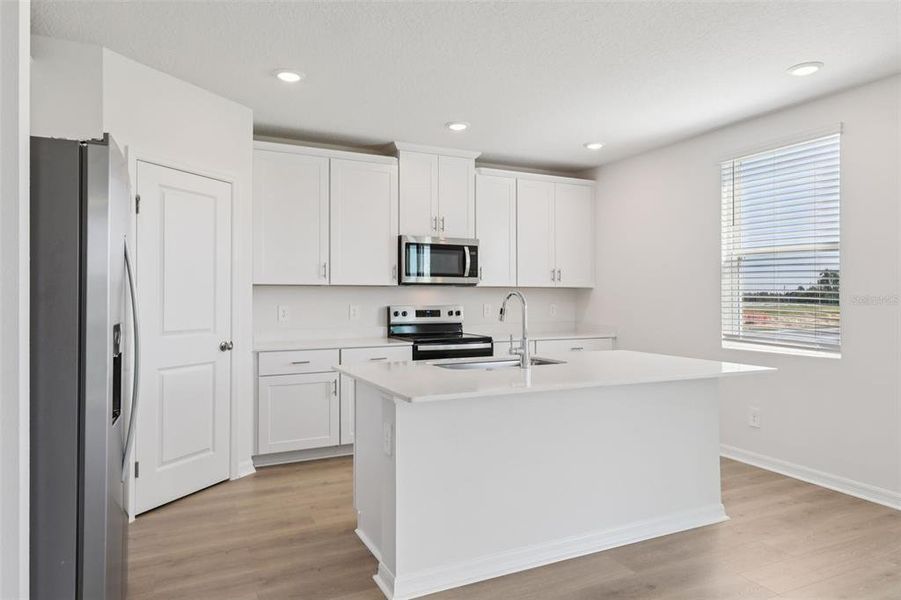 Furnished interior view inside a new home in Crosswinds - Signature Series, Haines City (Image 5).