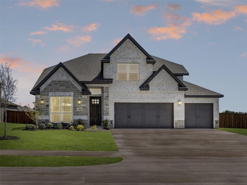 Front exterior of a new home in Lovers Landing, Forney, TX, highlighting curb appeal (Image 2). Front exterior of a new home in Lovers Landing, Forney, TX, highlighting curb appeal (Image 2).