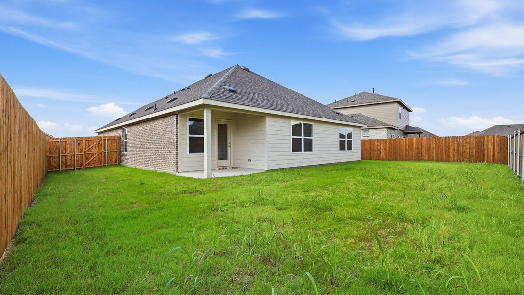 Exterior details and patio area of a home in Patriot Estates, Venus (Image 24).