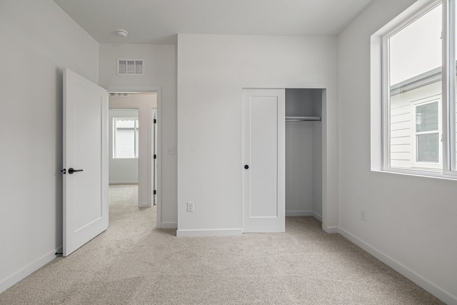 Spacious, unfurnished interior of a new home in Painted Prairie, Aurora (Image 36).