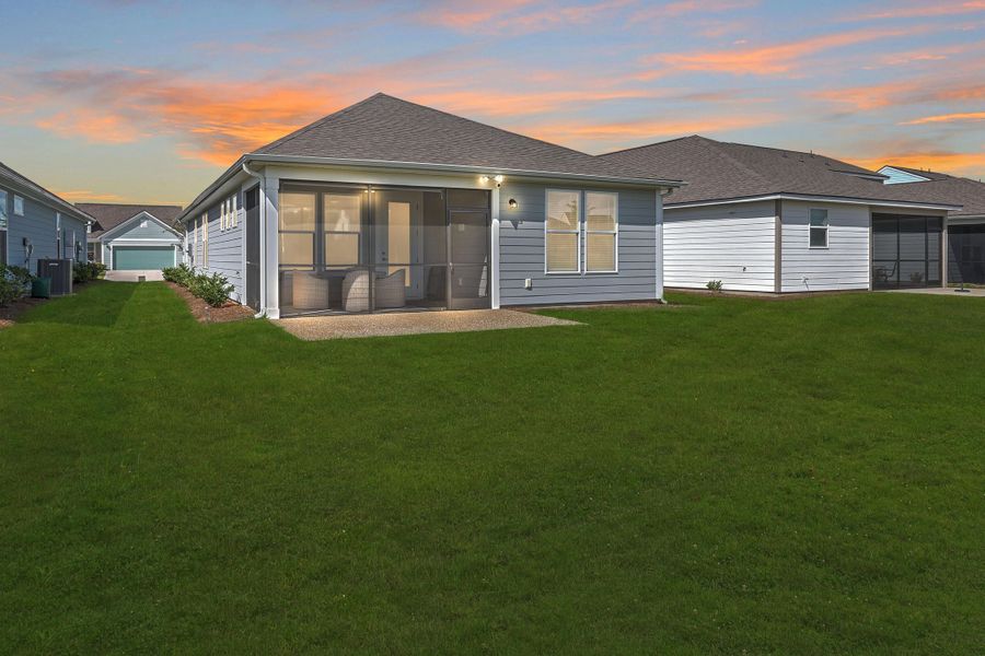 Front exterior of a new home in Del Webb Charleston at Nexton, Summerville, SC, highlighting curb appeal (Image 27). Front exterior of a new home in Del Webb Charleston at Nexton, Summerville, SC, highlighting curb appeal (Image 27).
