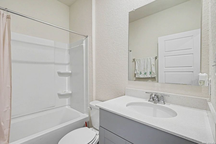 Furnished interior view inside a new home in Lily Springs, Seguin (Image 15).
