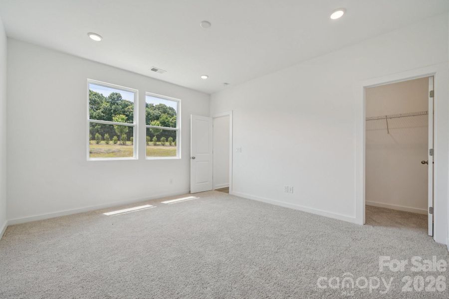 Spacious, unfurnished interior of a new home in Meadow Creek Village, Locust (Image 18).