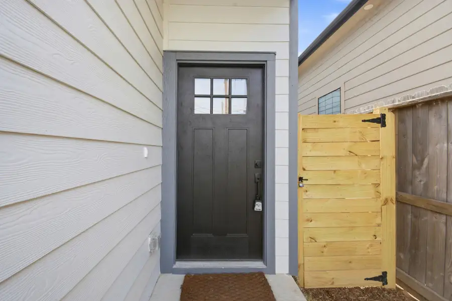 Exterior details and patio area of a home in , Houston (Image 2). Exterior details and patio area of a home in , Houston (Image 2).