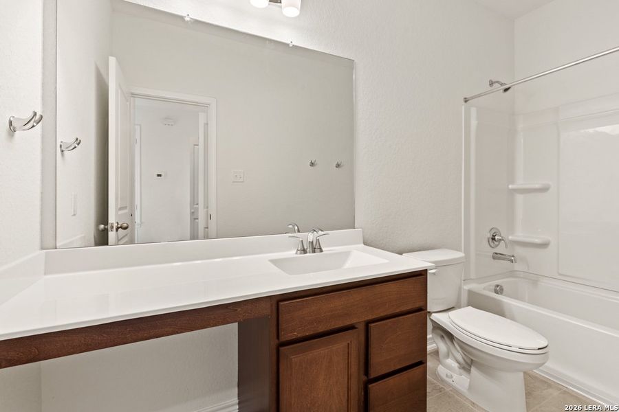 Furnished interior view inside a new home in Woodside Farms, Seguin (Image 9).