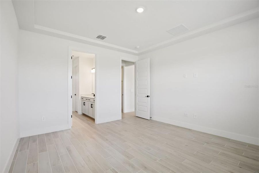 Spacious, unfurnished interior of a new home in Magnolia Bay - Reserve Series, Nokomis (Image 17).