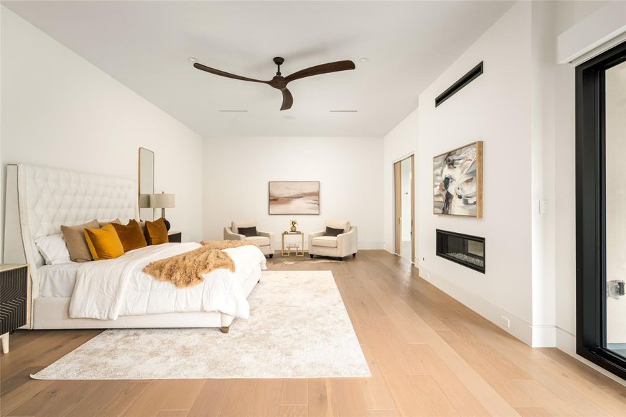 Serene primary retreat defined by generous scale, clean lines, and a refined, understated palette.