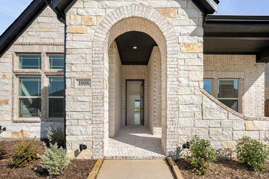 Exterior details and patio area of a home in Timberbrook 3B-4A, Justin (Image 18).