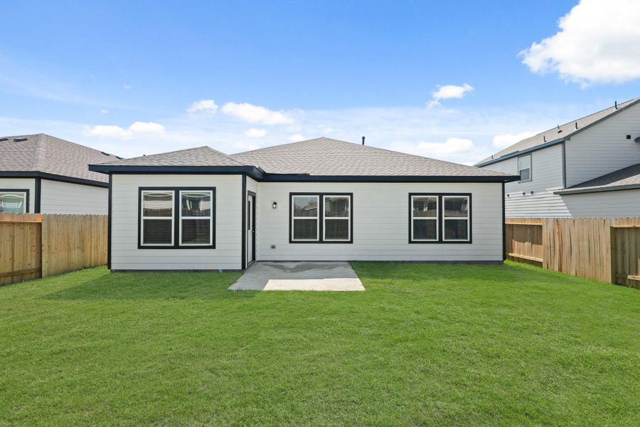 Front exterior of a new home in Caney Mills, Conroe, TX, highlighting curb appeal (Image 20).