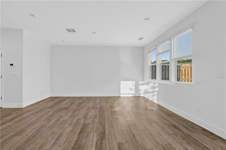 Spacious, unfurnished interior of a new home in Towns at Holly Springs, Holly Springs (Image 15).