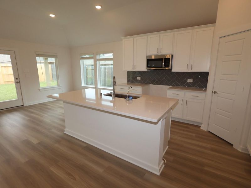 Furnished interior view inside a new home in Pinewood at Grand Texas, New Caney (Image 3).
