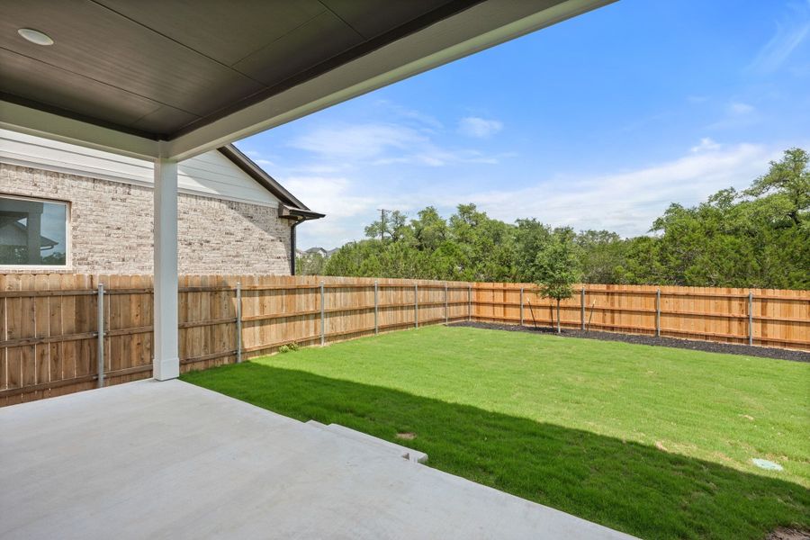 Exterior details and patio area of a home in Heritage, Dripping Springs (Image 4).
