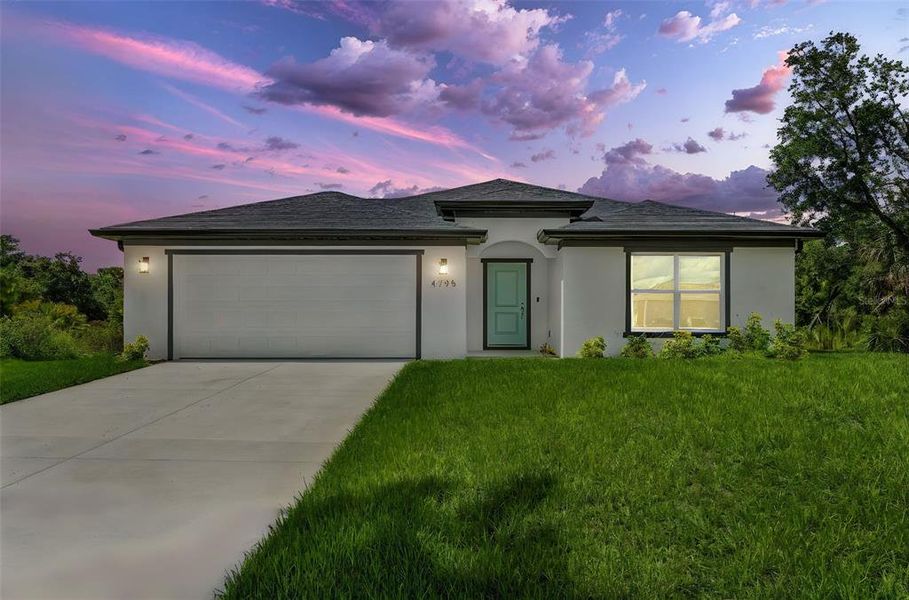 Front exterior of a new home in , North Port, FL, highlighting curb appeal (Image 1).