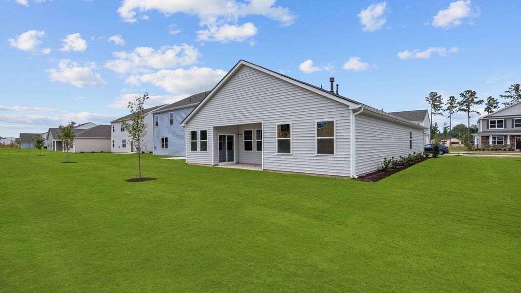 Exterior details and patio area of a home in West New Bern, New Bern (Image 16).