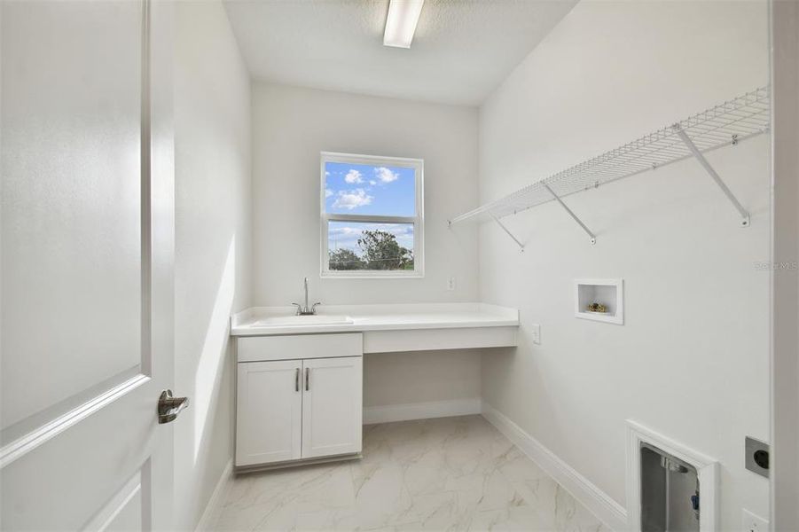 Utility Room **Photos are of a Similar Home