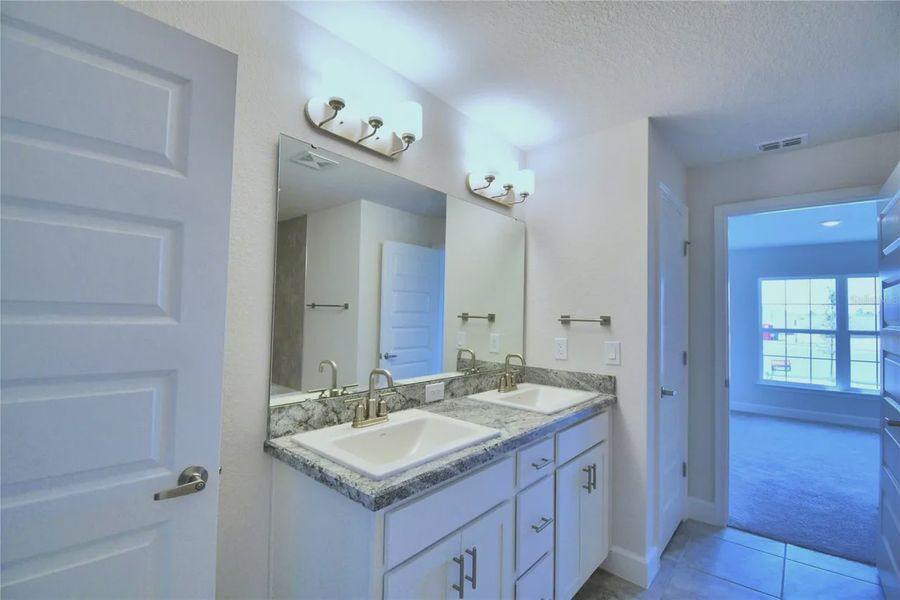 Furnished interior view inside a new home in Cadence Crossing, Auburndale (Image 11).