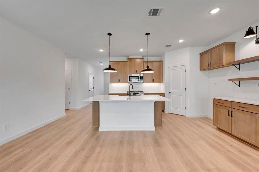 Furnished interior view inside a new home in Aspire at Reunion, Newark (Image 6).
