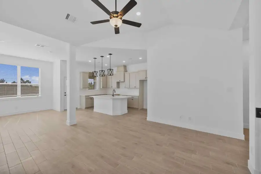 Representative unfurnished interior of a home built from the Margaux by Chesmar Homes in Bridgeland Chateau, Cypress (Image 22).