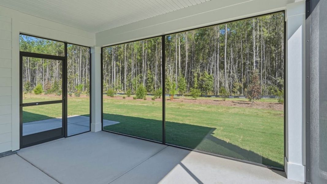 Exterior details and patio area of a home in Sun City Hilton Head, Bluffton (Image 28).