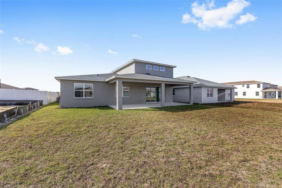 Exterior details and patio area of a home in Calesa Township, Ocala (Image 27).