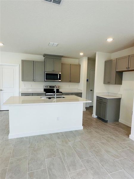 Furnished interior view inside a new home in Cyrene at Harmony, St. Cloud (Image 10). Furnished interior view inside a new home in Cyrene at Harmony, St. Cloud (Image 10).