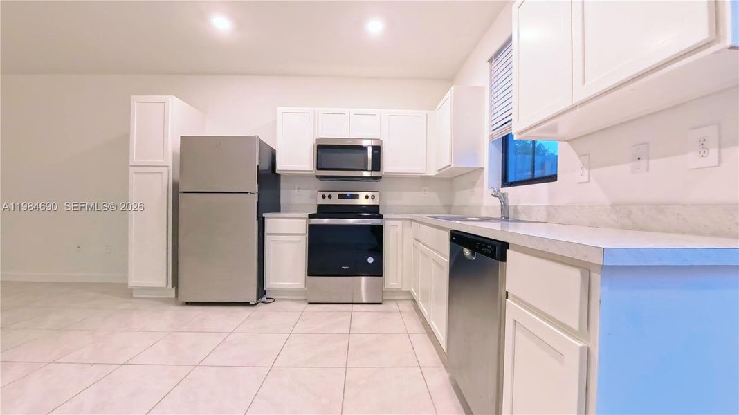Furnished interior view inside a new home in , Florida City (Image 4).