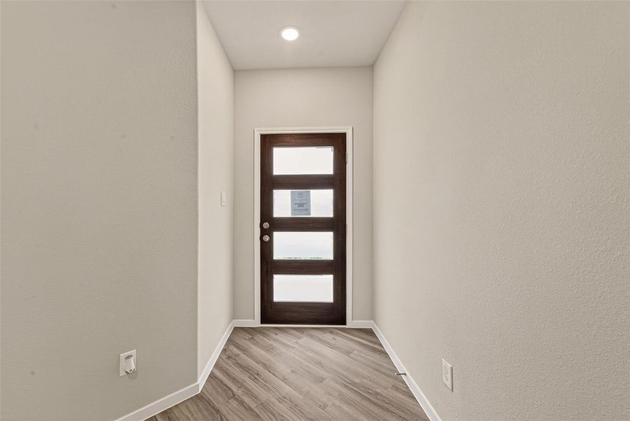 Spacious, unfurnished interior of a new home in Sunterra, Katy (Image 18).