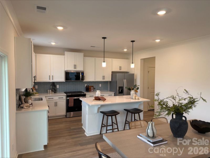 Furnished interior view inside a new home in Bella Vista Heritage, Denver (Image 3).