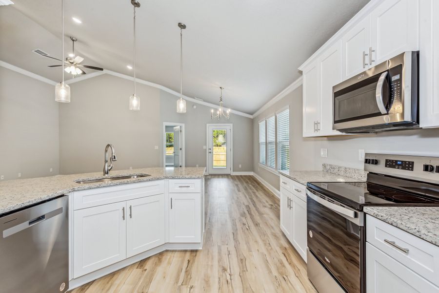 Representative furnished interior of a home built from the The Carlos by Herbst Homes in Doyle Hawkins Landing, Navarre (Image 65).