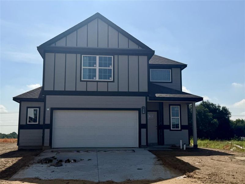 Front exterior of a new home in Hanna Ranch, Fort Worth, TX, highlighting curb appeal (Image 1). Front exterior of a new home in Hanna Ranch, Fort Worth, TX, highlighting curb appeal (Image 1).