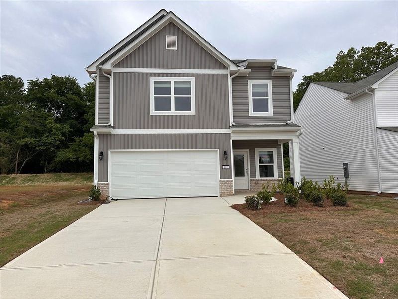 Front exterior of a new home in , Rockmart, GA, highlighting curb appeal (Image 1). Front exterior of a new home in , Rockmart, GA, highlighting curb appeal (Image 1).