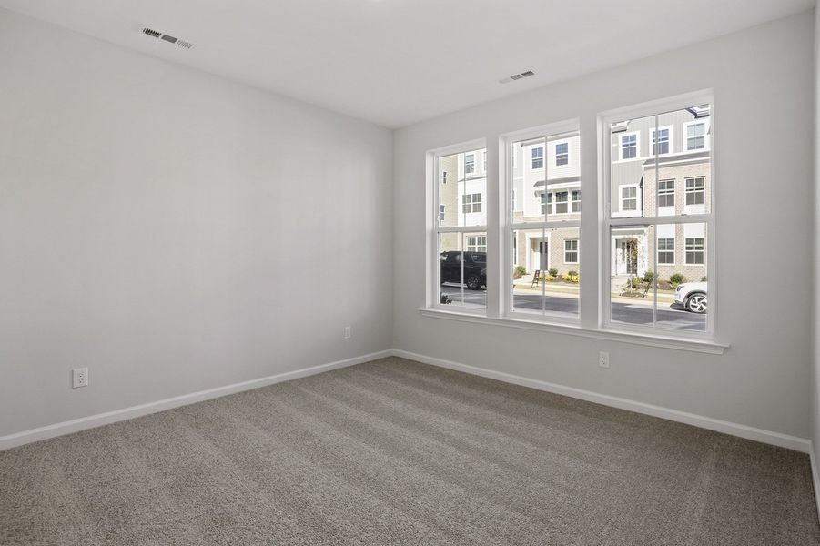 Spacious, unfurnished interior of a new home in Renaissance at White Oak, Garner (Image 30).