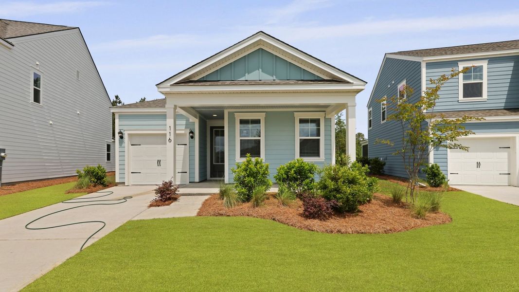 Front exterior of a new home in Sheep Island, Summerville, SC, highlighting curb appeal (Image 18).