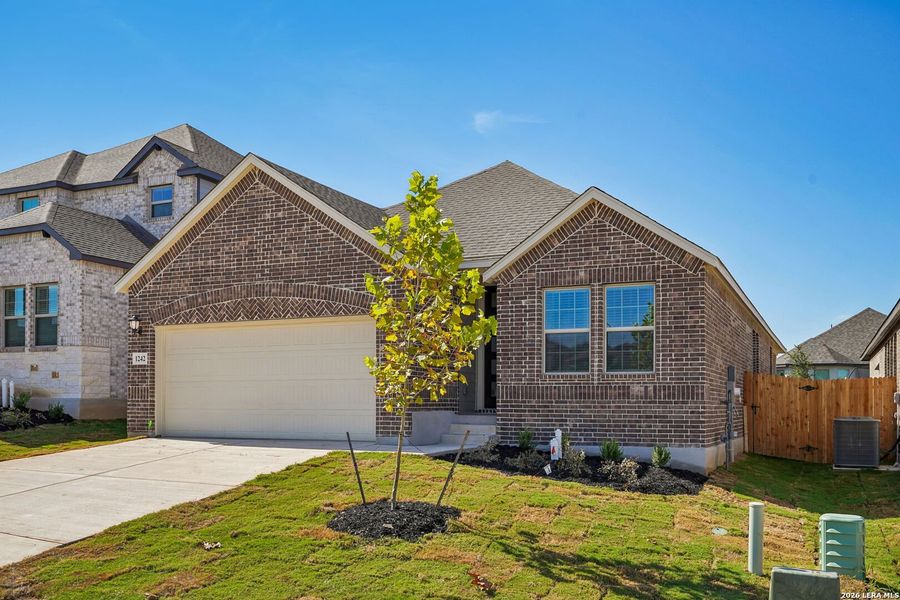 Front exterior of a new home in Arcadia Ridge - Premier Series, San Antonio, TX, highlighting curb appeal (Image 2). Front exterior of a new home in Arcadia Ridge - Premier Series, San Antonio, TX, highlighting curb appeal (Image 2).