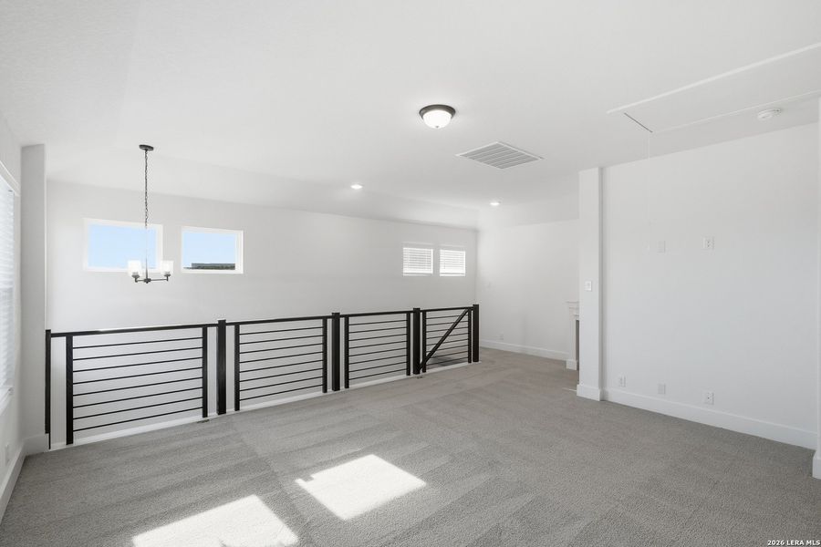 Spacious, unfurnished interior of a new home in Prominence, San Antonio (Image 32).