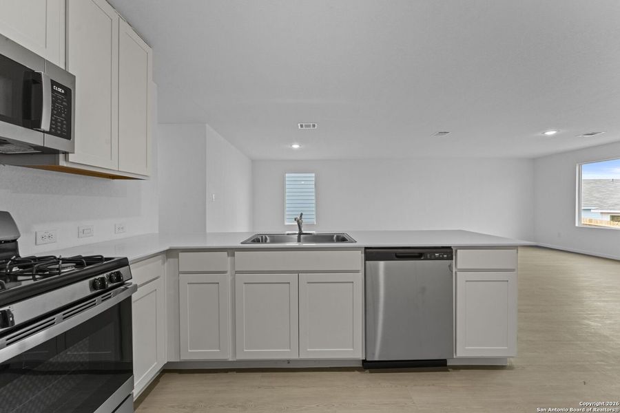 Furnished interior view inside a new home in , New Braunfels (Image 7).