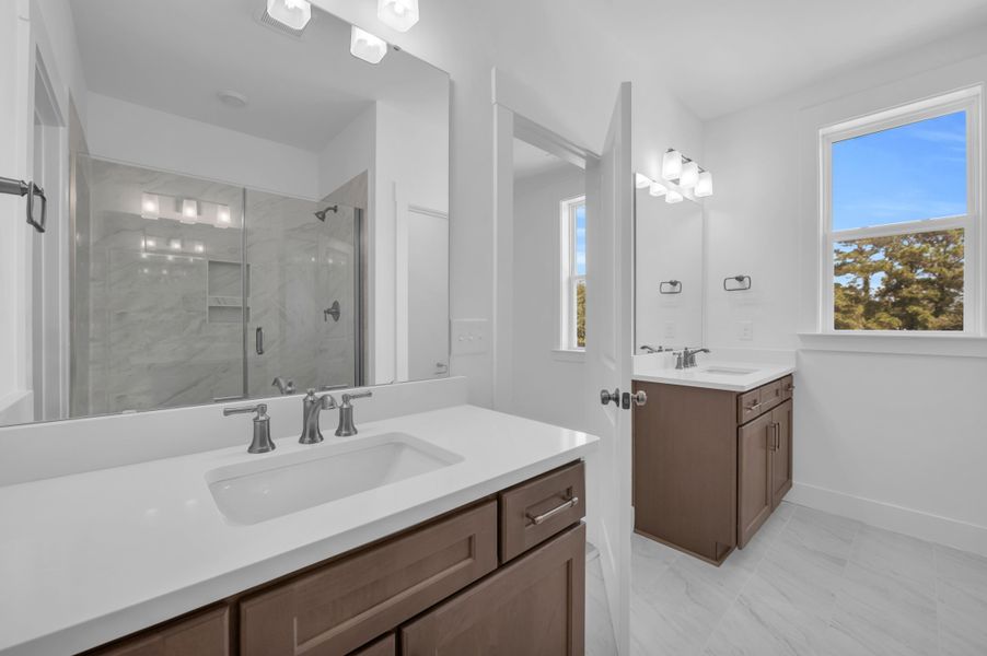 Representative furnished interior of a home built from the The Whitley by RobuckHomes in Windwater, Hampstead (Image 59).