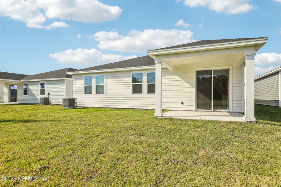 Exterior details and patio area of a home in Cypress Meadows - Signature Series, Jacksonville (Image 19).