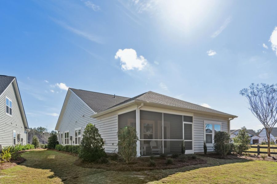 Exterior details and patio area of a home in Horizons at Summers Corner | 55+, Summerville (Image 26).