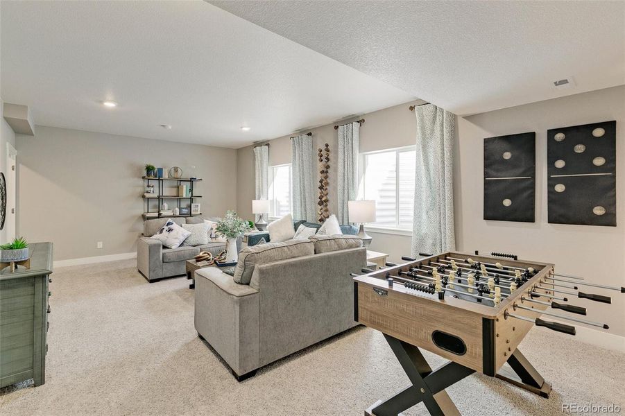 Furnished interior view inside a new home in Trails at Crowfoot, Parker (Image 26).