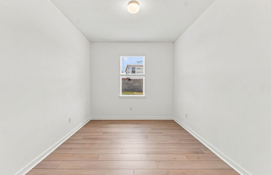 Spacious, unfurnished interior of a new home in Vida's Way, Wesley Chapel (Image 18).